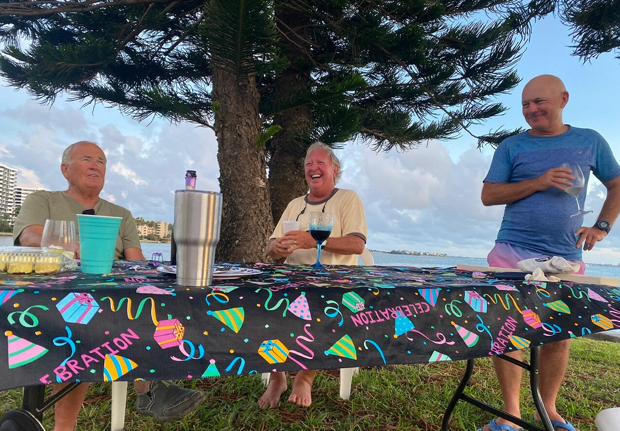 Property owners enjoying the waterfront dining area